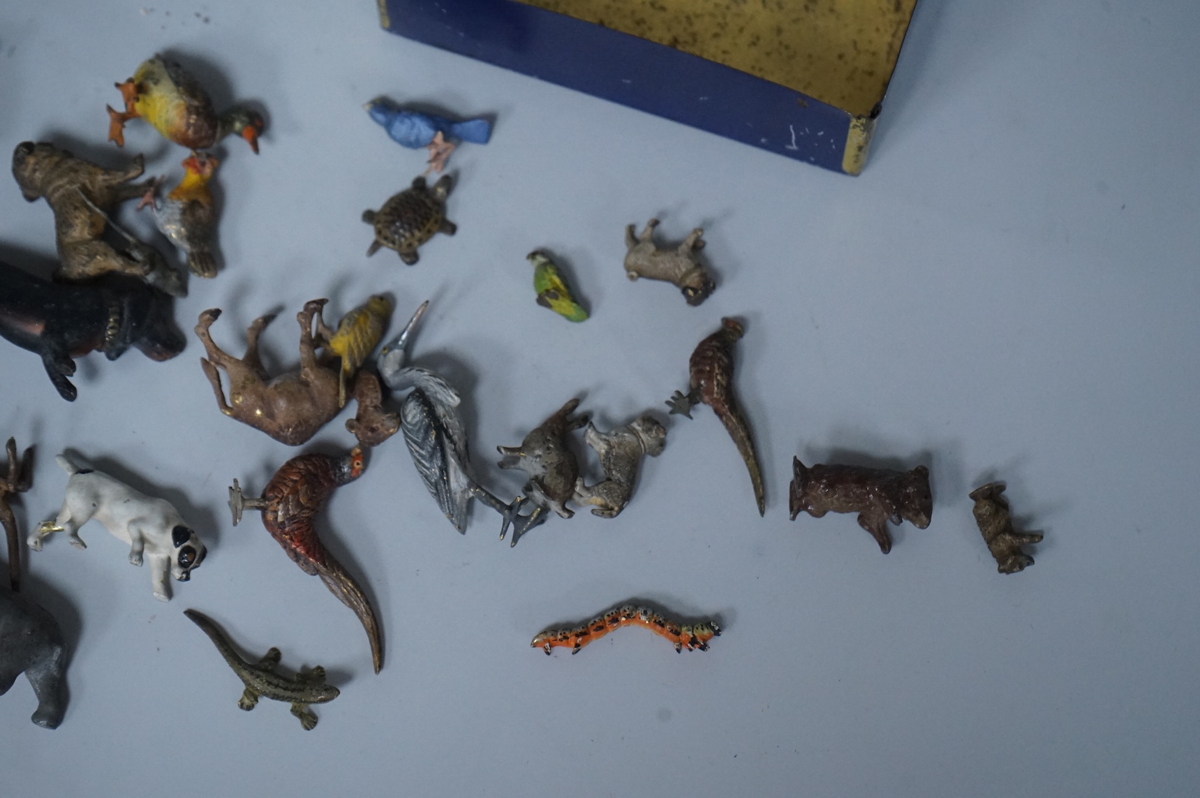 A group of Austrian miniature cold painted bronze and spelter animal and bird figures, largest 6cm wide